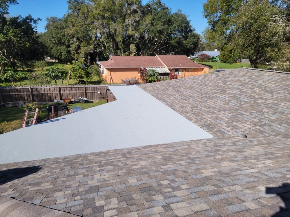 Slide of Yowell's Roofing