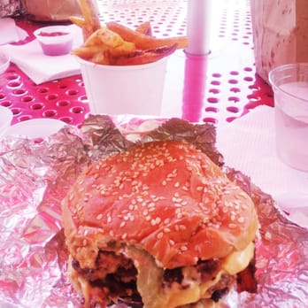 Five Guys - Regular bacon cheeseburger (comes with 2 patties, the Little size comes with 1) and Cajun fries in the background - Burgers Near Me - Torrance, California Five Guys - Regular bacon cheeseburger (comes with 2 patties, the Little size comes with 1) and Cajun fries in the background - Burgers Near Me - Torrance, California