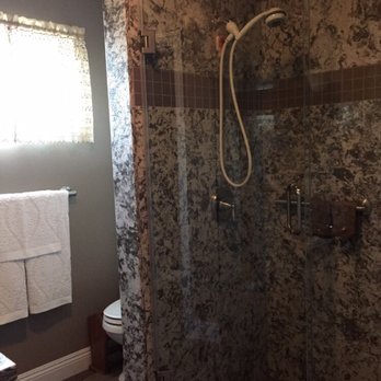 Millenium Tile & Marble - Shower with slab quartz walls - General Contractors Near Me - Anaheim, California