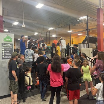 Rockin Jump Modesto - Neon nights was about to start. Staff was explaining the rules. - Trampoline Parks Near Me - Modesto, California