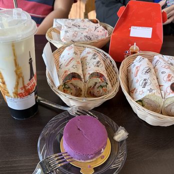 Paris Banh Mi - Fruit tea and coffee not pictured. Ube cheesecake, macarons, banh mi on baguette. - Sandwiches Near Me - Davis, California