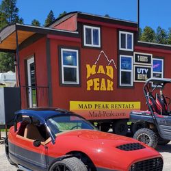 Mad Peak Vacation Lodging and UTV Rental - Vanderhall 3 wheeler on highway rentals at the Caboose