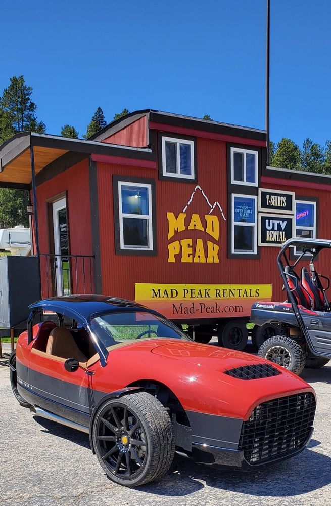 Mad Peak Vacation Lodging and UTV Rental Logo
