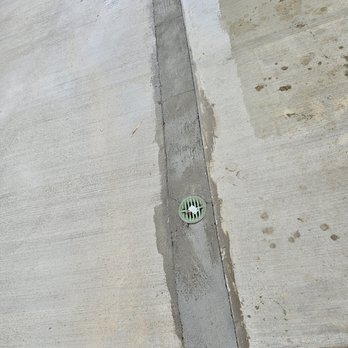 L&M Concrete - Trench filled in with concrete.  Crudely finished and color doesn't match. - Masonry/Concrete Near Me
