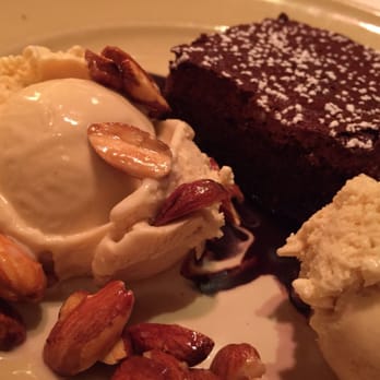 Chez Panisse - Airy fluffy Pavé chiocolate brownie type with delightful fresh vanilla bean ice cream - New American Near Me - Berkeley, California