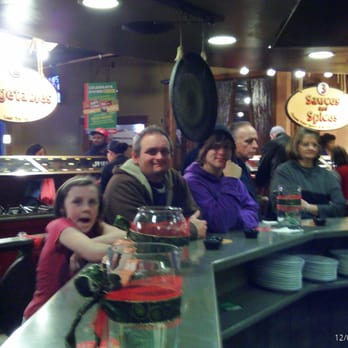 BD's Mongolian Grill - Here is the guys by the grill getting their food cooked. - Mongolian Near Me - Lexington, Kentucky BD's Mongolian Grill - Here is the guys by the grill getting their food cooked. - Mongolian Near Me - Lexington, Kentucky