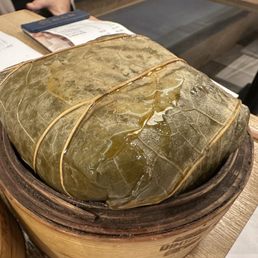 Steamed Glutinous Rice w/Chicken wrapped in Lotus Leaf Steamed Glutinous Rice w/Chicken wrapped in Lotus Leaf
