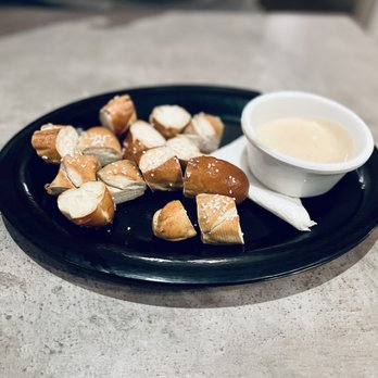 House - a plate of pretzels and dipping sauce - Bars Near Me - Emmaus, Pennsylvania
