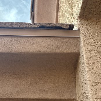 HAVN Roofing - Broken and misaligned tiles at edge allowing water and debris to enter system. - Roofing Near Me - Gilbert, Arizona