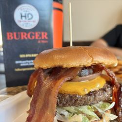 HD Burger & More - Candy Bacon Burger side of fries. Really, Really good. I mean for the price "JUST LOOK AT THE SIZE OF THESE BURGERS"!
