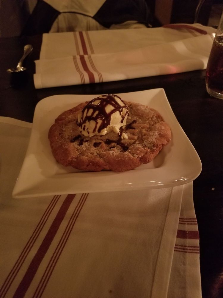 Dessert homemade peanut butter cookie with homemade vanilla ice cream and chocolate drizzle Yelp