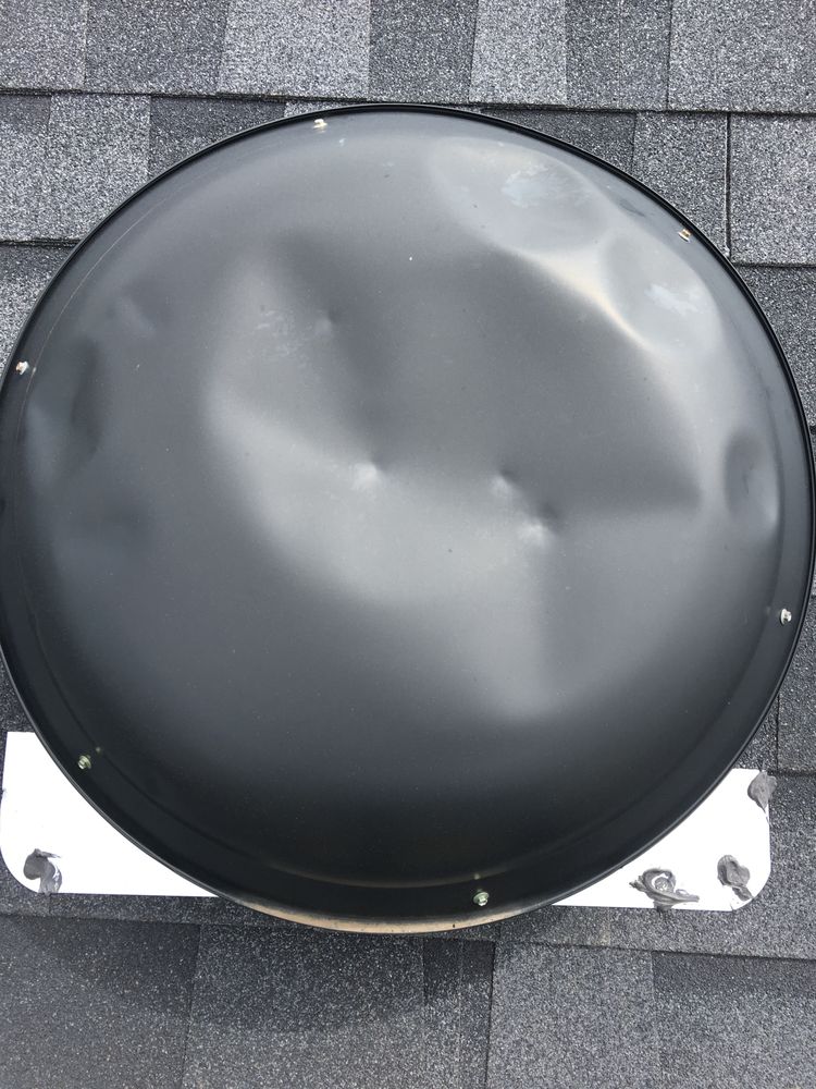 Slide of DNA Roofing & Construction