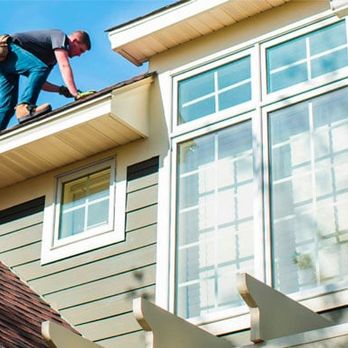 Northface Construction - a man on the roof of a house - Roofing Near Me - Elk River, Minnesota Northface Construction - a man on the roof of a house - Roofing Near Me - Elk River, Minnesota