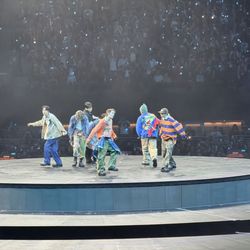 BTS at MetLife 8/1, outfitted by Ralph Lauren. Turtleneck, ski vest, wool beanie? It was 80 degrees! Ralph Lauren needs to do better.