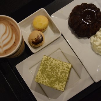 Coffee Monster - (From left to right): Caramel mocha, honeycomb lavender & salted caramel macarons, matcha tiramisu, lava cake with whipped cream - Coffee & Tea Near Me - Surrey, British Columbia Coffee Monster - (From left to right): Caramel mocha, honeycomb lavender & salted caramel macarons, matcha tiramisu, lava cake with whipped cream - Coffee & Tea Near Me - Surrey, British Columbia
