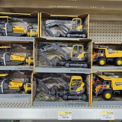 Rural King Supply - Just what any kid or young at heart adult would want... A Volvo asphalt paver and steam roller haha!