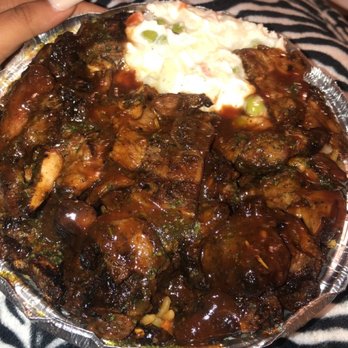 Avenue BBQ Hut - Bbq lamb with extra bbq sauce on top and green seasoning - Trinidadian Near Me - Jamaica, New York