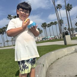 My son eating the ham and Ham & Cheese Empanada My son eating the ham and Ham & Cheese Empanada