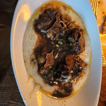 Blvck Cow - The oxtail and grits. - Cocktail Bars Near Me - Bowie, Maryland