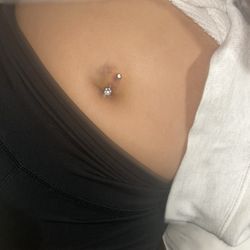 Read Em and Weep Tattoos and Piercing - navel piercing