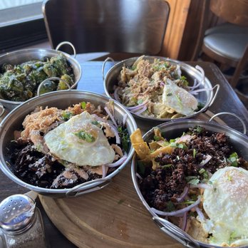 Luchador Bar +Kitchen - Chilaquiles flight: chorizo, carnitas, mole/tinga - Mexican Near Me - Pomona, California