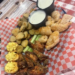 Texan Sampler . Chicken wings were tiny. The deep fried deviled eggs had no flavor