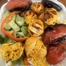 Chicken platter with 1/2 rice 1/2 salad and added grilled tomatoes Chicken platter with 1/2 rice 1/2 salad and added grilled tomatoes