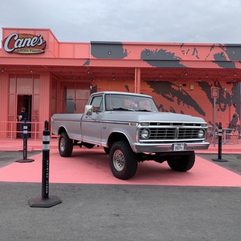 Raising Cane's Chicken Fingers - THIS is the place! I was so confused why this brand new location was under remodel... well, SURPRISE!! It's Post Malone's design! #hawtpink - Chicken Shop Near Me - Midvale, Utah Raising Cane's Chicken Fingers - THIS is the place! I was so confused why this brand new location was under remodel... well, SURPRISE!! It's Post Malone's design! #hawtpink - Chicken Shop Near Me - Midvale, Utah