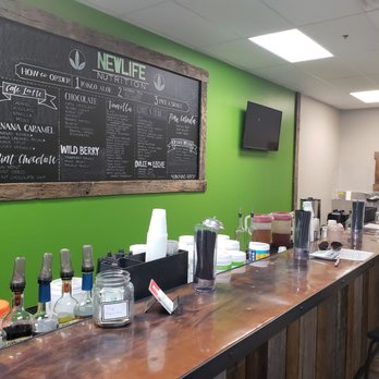 New Life Nutrition - a bar with a menu on the wall - Juice Bars & Smoothies Near Me - New Albany, Ohio New Life Nutrition - a bar with a menu on the wall - Juice Bars & Smoothies Near Me - New Albany, Ohio