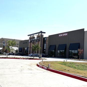 Home Zone Furniture - Entrance to Home Zone Allen on the southbound US 75 service road. - Furniture Stores Near Me - Allen, Texas
