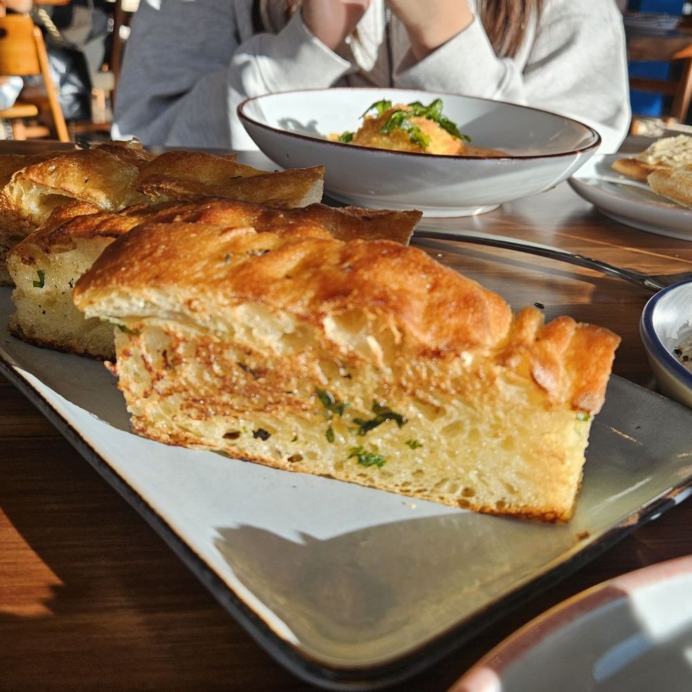 Alora Social - Look how golden the foccacia bread is here - Mediterranean Near Me - San Ramon, California Alora Social - Look how golden the foccacia bread is here - Mediterranean Near Me - San Ramon, California