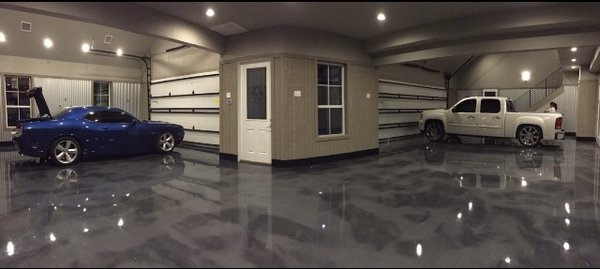 Customized Garage Flooring - These Extraordinary garage projects feature stunning polished concrete and an epoxy overlay that transforms the space into a sleek, modern oasis. The seamless, high-gloss finish not only enhances the aesthetic appeal but also offers exceptional durability and easy maintenance. With intricate patterns and vibrant color options, the overlay adds a unique flair, making the garage a stylish extension of the home. Ideal for both functionality and visual impact, this project exemplifies innovative design in residential spaces. Customized Garage Flooring - These Extraordinary garage projects feature stunning polished concrete and an epoxy overlay that transforms the space into a sleek, modern oasis. The seamless, high-gloss finish not only enhances the aesthetic appeal but also offers exceptional durability and easy maintenance. With intricate patterns and vibrant color options, the overlay adds a unique flair, making the garage a stylish extension of the home. Ideal for both functionality and visual impact, this project exemplifies innovative design in residential spaces.