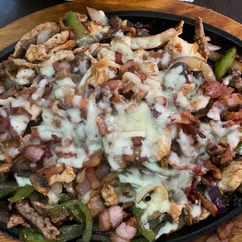 Pacifico Mexican Bar & Grill - Texas fajitas. (Steak, chicken, shrimp, bacon, mushrooms) - Bars Near Me - Viroqua, Wisconsin Pacifico Mexican Bar & Grill - Texas fajitas. (Steak, chicken, shrimp, bacon, mushrooms) - Bars Near Me - Viroqua, Wisconsin