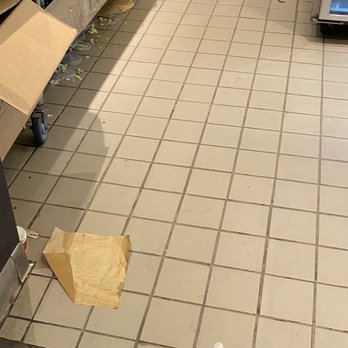 Chipotle Mexican Grill - Another pic of workstation floor where meals are being assembled for pickup orders! IT IS SO DIRTY! - Fast Food Near Me - Nanuet, New York Chipotle Mexican Grill - Another pic of workstation floor where meals are being assembled for pickup orders! IT IS SO DIRTY! - Fast Food Near Me - Nanuet, New York