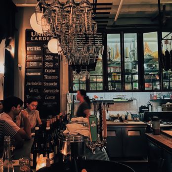 Union Larder - people sitting at a bar - Wine Bars Near Me - San Francisco, California Union Larder - people sitting at a bar - Wine Bars Near Me - San Francisco, California