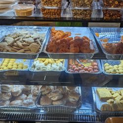 Spices Hut - Fresh Snacks and Sweet counter inside the grocery store. fried snacks like samosa, pakkodas are on an adjacent shelf not seen in this pic