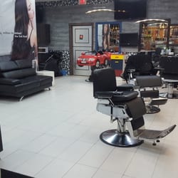 New York North - View of barber's area, with a little car seat for the kids