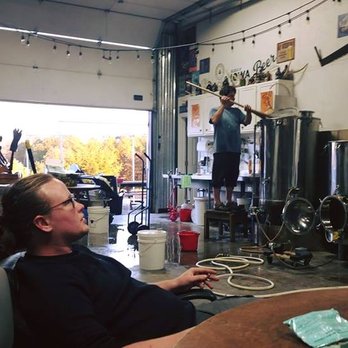 Big Rack Brew Haus - a man sitting at a table in a brewery - Breweries Near Me - Winterset, Iowa Big Rack Brew Haus - a man sitting at a table in a brewery - Breweries Near Me - Winterset, Iowa