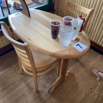 Coconuts Fish Cafe - Surf board table and drinks - Seafood Near Me - Kihei, Hawaii Coconuts Fish Cafe - Surf board table and drinks - Seafood Near Me - Kihei, Hawaii