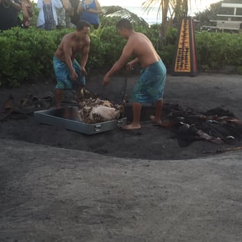 Germaine's Luau - They bring you to the fire pit to witness the removal of the pig from the fire hole. Funny and interesting. - Hawaiian Near Me - Kapolei, Hawaii