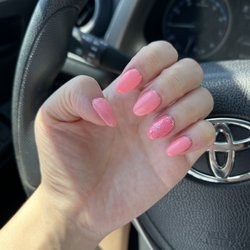 Elena Nail Spa - Feeling bold and Springy! Got a pink silver glitter nail accent