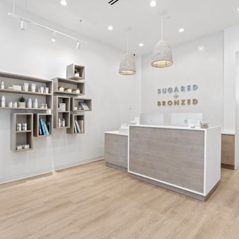 SUGARED + BRONZED - S+B Williamsburg product shelves and reception desk - Tanning Near Me - Brooklyn, New York