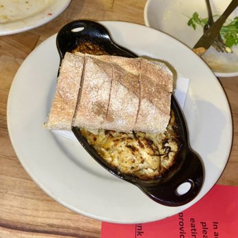 Mas Tapas - a plate of food on a table - Tapas Bars Near Me - Charlottesville, Virginia