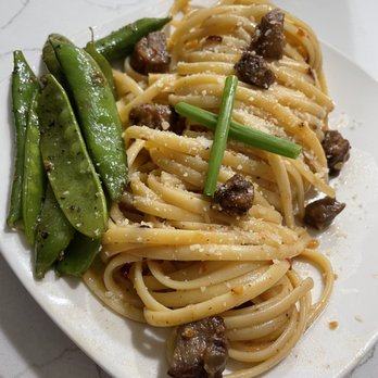 Trendyyy Kitchen - a plate of pasta and peas - Italian Near Me - New York , New York Trendyyy Kitchen - a plate of pasta and peas - Italian Near Me - New York , New York