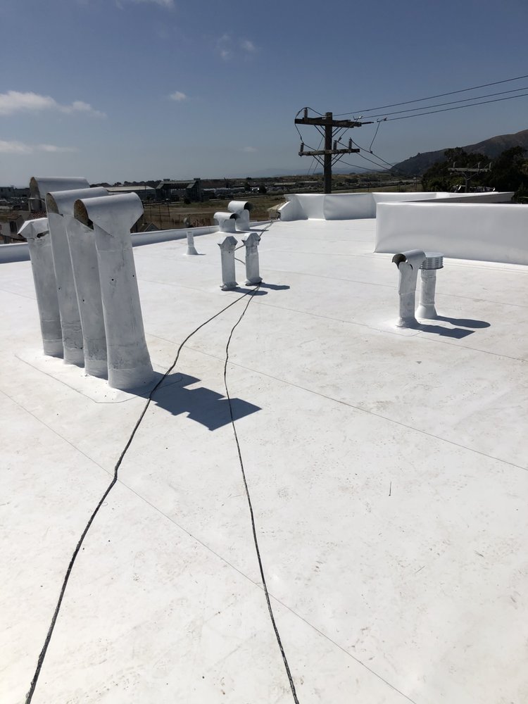 Slide of Manny's Roofing Inc