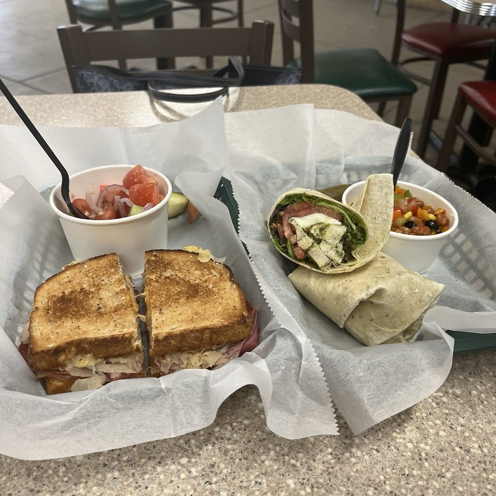 Rueben with side of cucumber, tomato and onion and Grilled Chicken Basil Pesto wrap with Cowboy Caviar! Rueben with side of cucumber, tomato and onion and Grilled Chicken Basil Pesto wrap with Cowboy Caviar!