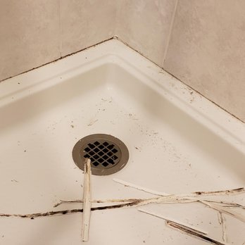 Handy Man Home Repair Expert - As we've been re-doing the work, pulling off silicone, we can see the old grout wasn't removed at all. - Drywall Installation & Repair Near Me - glendale, Arizona Handy Man Home Repair Expert - As we've been re-doing the work, pulling off silicone, we can see the old grout wasn't removed at all. - Drywall Installation & Repair Near Me - glendale, Arizona