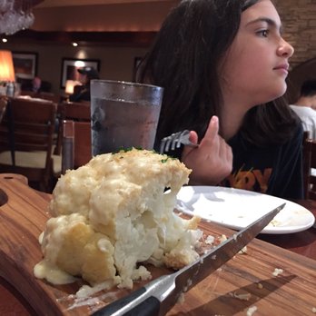 Seasons 52 - Whole roasted cauliflower with cheese sauce - New American Near Me - Mclean, Virginia