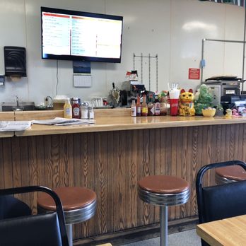 Hovie's - a woman sitting at the bar - Breakfast & Brunch Near Me - Eagan, Minnesota