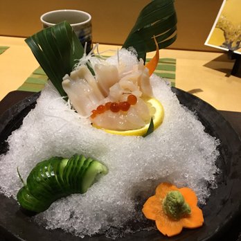 Omakase - Long neck clam and lobster tail sashimi with smoked ikura over a giant mound of shaved ice - Sushi Bars Near Me - San Francisco, California Omakase - Long neck clam and lobster tail sashimi with smoked ikura over a giant mound of shaved ice - Sushi Bars Near Me - San Francisco, California